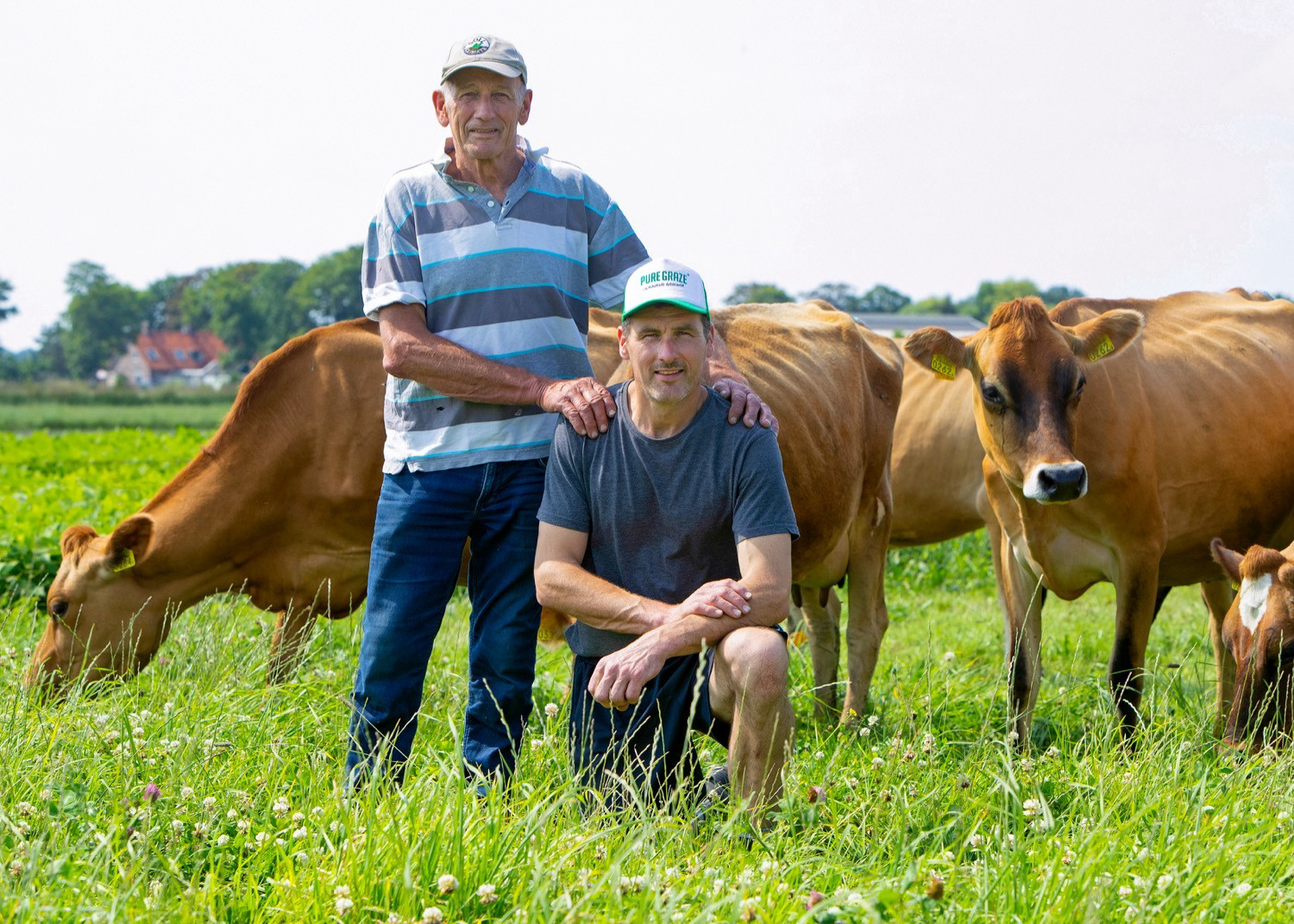 Dairy farmers Albert and son Jelle Hakvoort with their cross-bred cows.